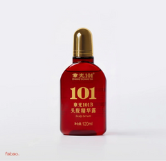 A red bottle of Zhang Guang 101 Scalp Serum with a metallic gold cap, set against a plain light gray background.