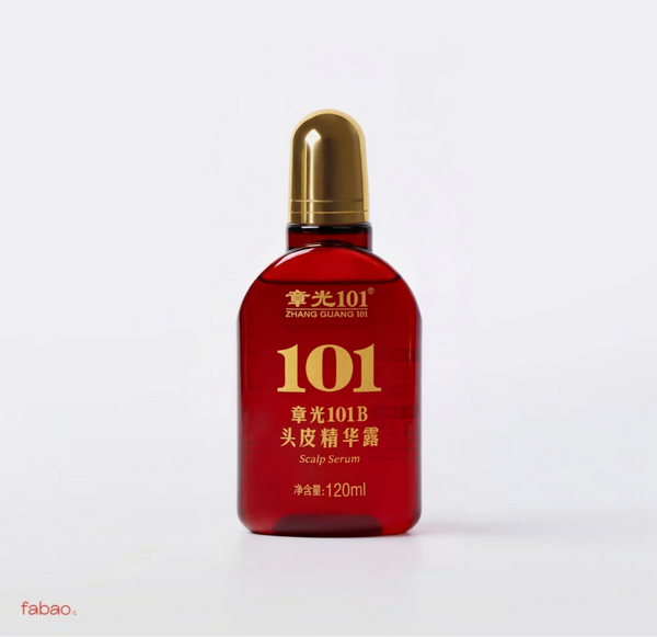 A red bottle of Zhang Guang 101 Scalp Serum with a metallic gold cap, set against a plain light gray background.