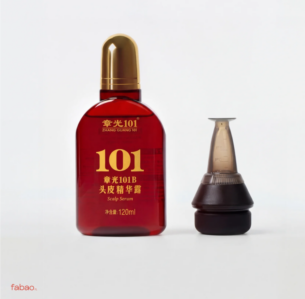 A red bottle of 101 Soap Serum with a gold cap next to its dark brown applicator tip, shown on a light gray background.