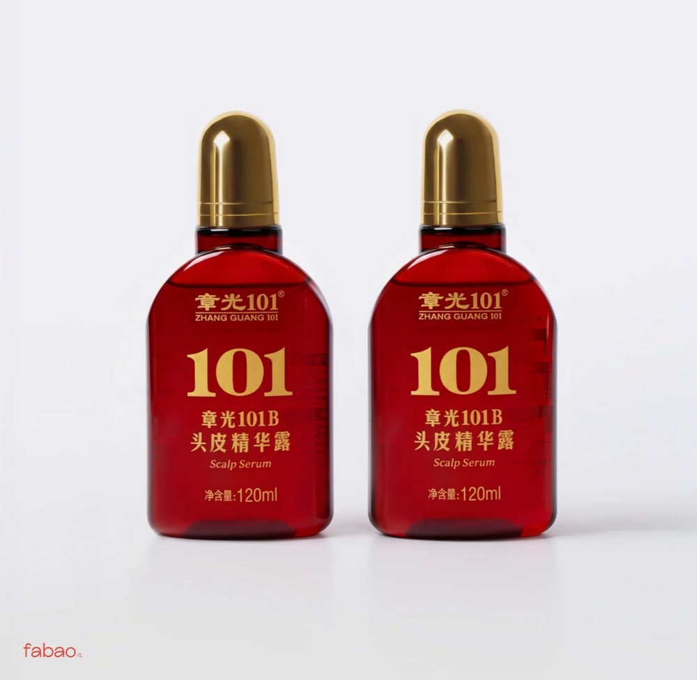 Two red bottles of Zhang Guang 101 Scalp Serum with gold caps, displayed side-by-side on a clean white background.