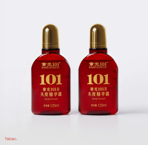Two red bottles of Zhang Guang 101 Scalp Serum with gold caps, displayed side-by-side on a clean white background.